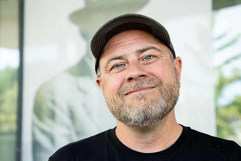 Porträt eines Mannes mit grauen Bart und schwarzer Cappie - copyright: Christophe Tauber - Ersteller: Christopher Tauber